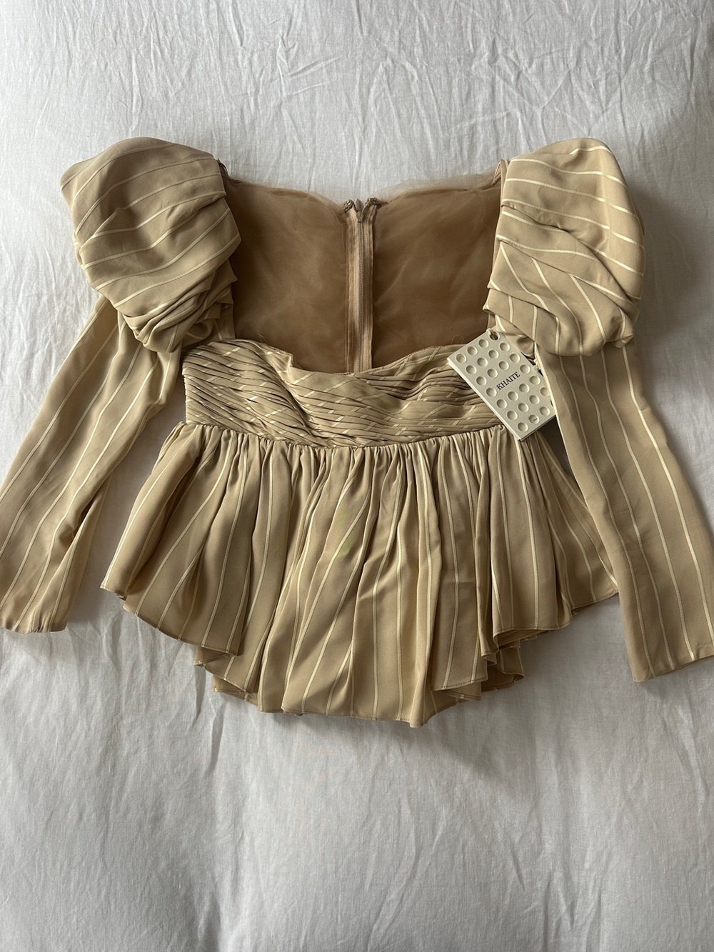 KHAITE Kim Peplum Top